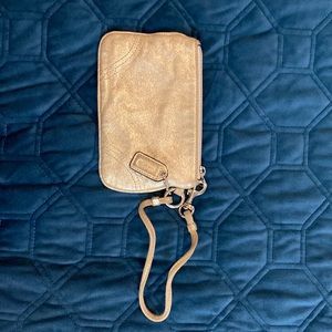 Gold Coach wrist bag